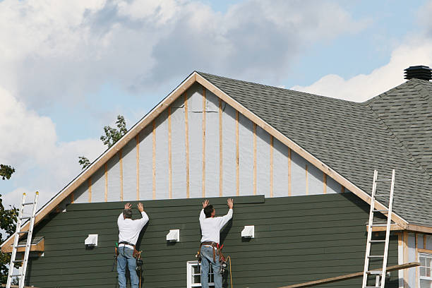 Professional Siding technician working in Centerville, IN
